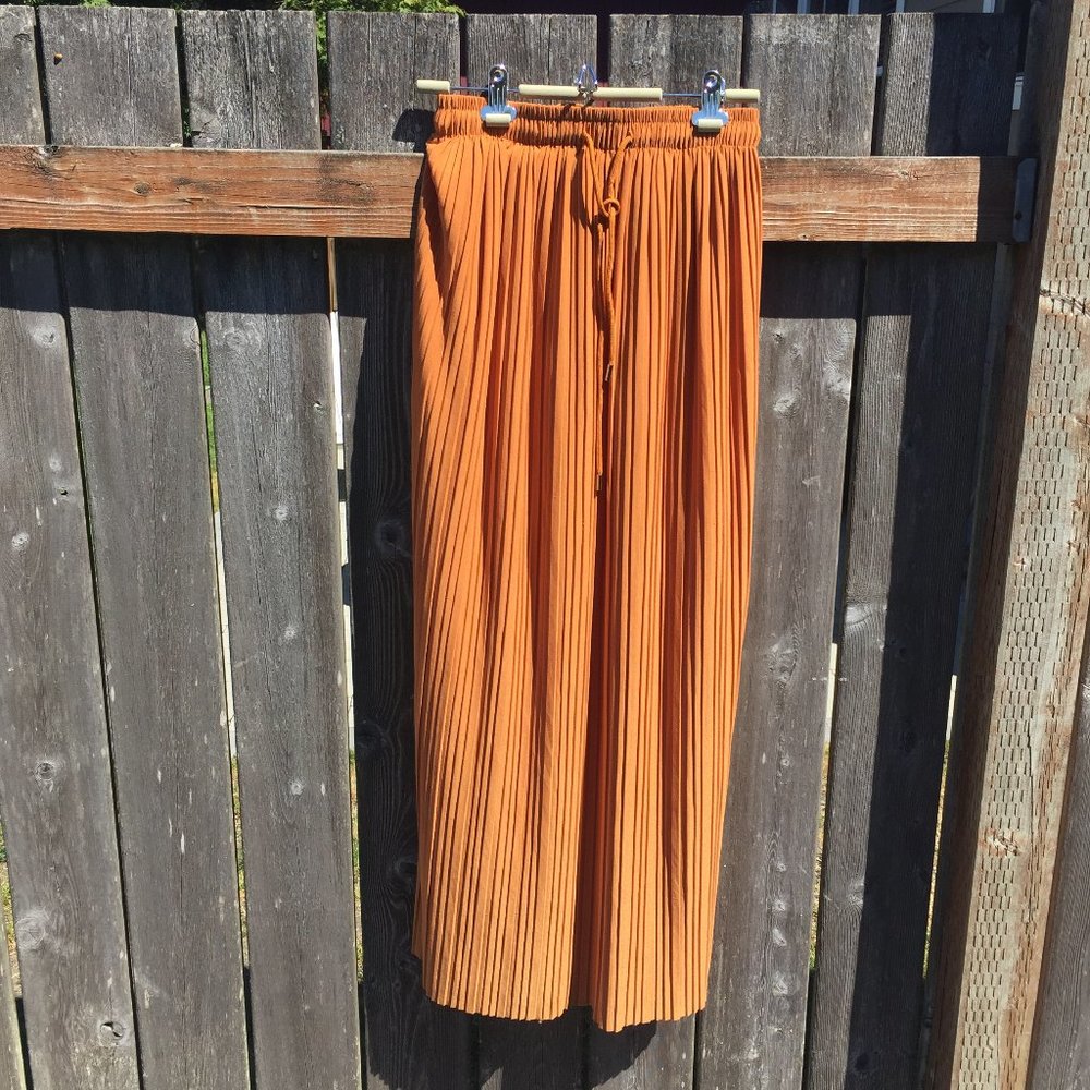 Full length gold/orange skirt